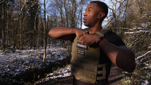 An image of a man, outside, wearing an Exersci branded weighted vest to illustrate the Exersci blog post entitled 'Walking With A Weighted Vest. Is It Good For Me?'